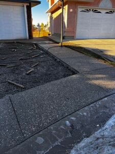 Exposed aggregate concrete surface with rich texture and detail in Calgary, Alberta