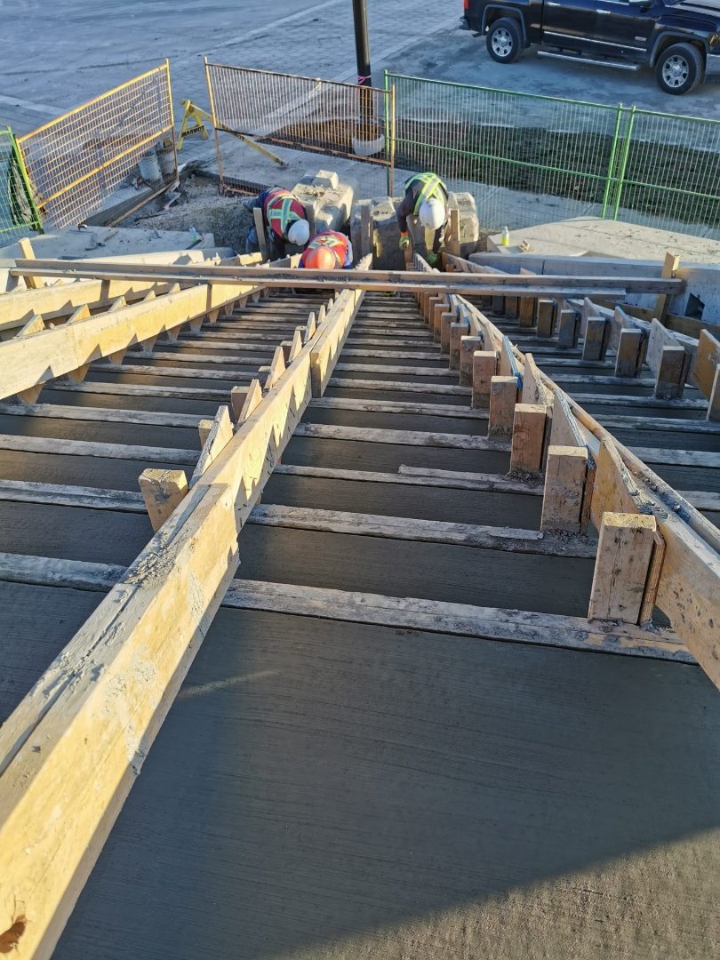 Concrete stairs under construction with wooden formwork, built by Vancal Concrete LTD in Calgary, Alberta.